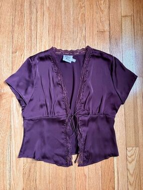 Princess Polly short sleeve satin top with tie closure and lace detail size 6